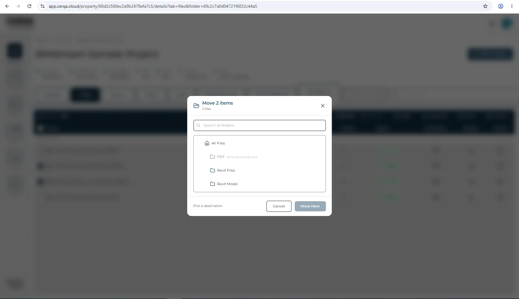 The Move 2 items modal open in the Files tab after selecting two files and clicking Move in the selection bar. It is a single pane with a Search all folders box at the top and a folder list beneath: All Files at the root with PDF, Revit Files and Revit Model indented under it. The folder the files already sit in carries the label Items are already here. Move Here in the footer stays disabled next to the hint Pick a destination until a folder is chosen.