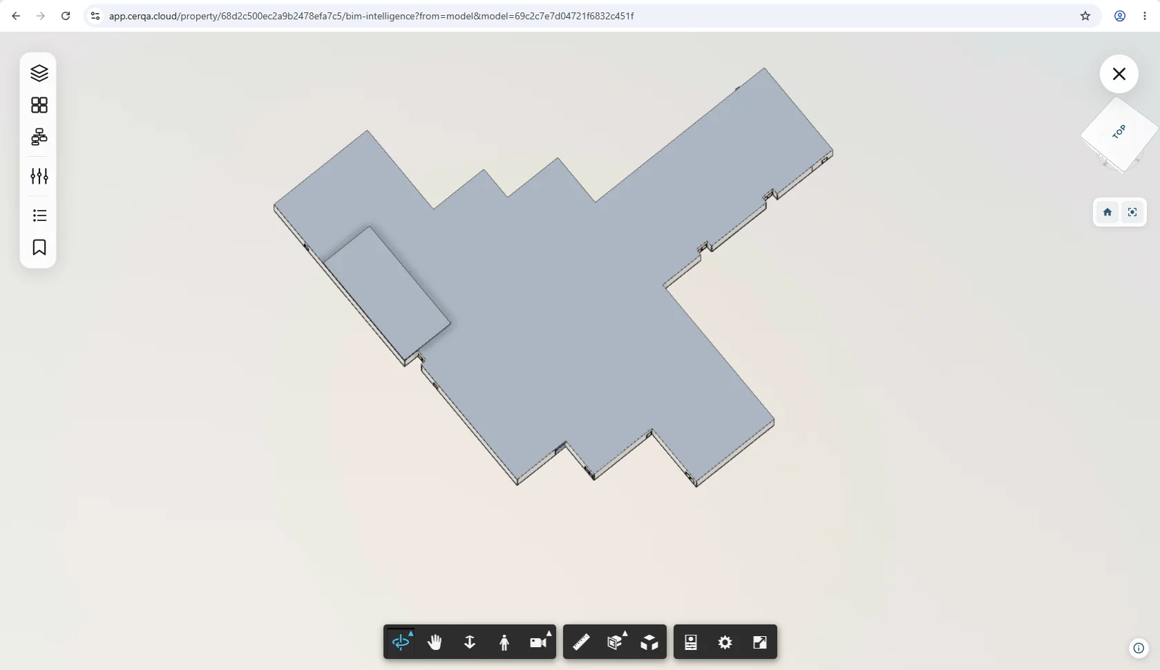 The BIM viewer mid-navigation, with the camera moved from the default angle: the model shown top-down and rotated, the view cube reading TOP, and the viewer toolbar along the bottom.