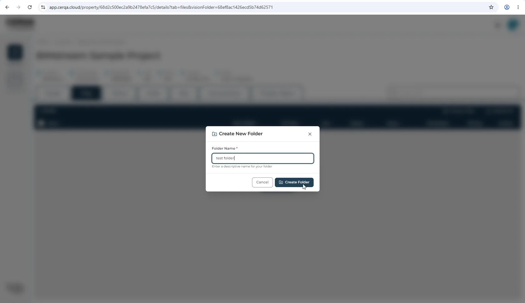 The 'Create New Folder' modal open in the Files tab, with a folder-name input field showing the example entry 'test folder', helper text 'Enter a descriptive name for your folder', and Cancel plus Create Folder buttons in the modal footer.